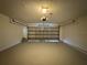 Attached garage with automatic door opener at 817 Highland Crest Loop, Lake Wales, FL 33853