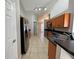 Modern kitchen with stainless steel appliances and ample counter space at 817 Highland Crest Loop, Lake Wales, FL 33853