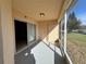 Screened-in porch with sliding glass doors at 817 Highland Crest Loop, Lake Wales, FL 33853