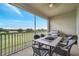 Screened lanai features golf course views and grill at 543 Ocean Course Ave, Davenport, FL 33896