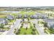Aerial view of a community with a playground and homes at 543 Ocean Course Ave, Davenport, FL 33896