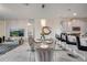 Glass dining table with seating for six at 543 Ocean Course Ave, Davenport, FL 33896