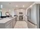 Modern kitchen with stainless steel appliances at 543 Ocean Course Ave, Davenport, FL 33896