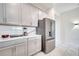 Modern kitchen with stainless steel appliances at 543 Ocean Course Ave, Davenport, FL 33896