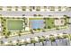 Aerial view of community amenities including a soccer field, basketball court, and playground at 543 Ocean Course Ave, Davenport, FL 33896