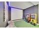 Game room with arcade games and a projector at 543 Ocean Course Ave, Davenport, FL 33896