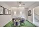 Game room with poker table and green carpet at 543 Ocean Course Ave, Davenport, FL 33896