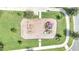 Overhead view of a community playground with play equipment at 543 Ocean Course Ave, Davenport, FL 33896