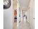 Bright hallway with view into living area and bedroom at 543 Ocean Course Ave, Davenport, FL 33896