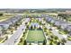 Aerial view of a community with a soccer field and basketball court at 543 Ocean Course Ave, Davenport, FL 33896