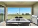 Spacious screened lanai with outdoor dining and grill at 543 Ocean Course Ave, Davenport, FL 33896