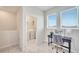Convenient laundry area with washer, dryer, and workspace at 543 Ocean Course Ave, Davenport, FL 33896