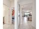 Hallway with mirror and view into living area and bedroom at 543 Ocean Course Ave, Davenport, FL 33896
