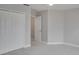 Bright bedroom with ample closet space and neutral wall colors at 7041 Buttonbush Loop, Harmony, FL 34773