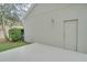 Exterior view of the house with a storage room at 7041 Buttonbush Loop, Harmony, FL 34773