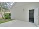 Exterior view of the house with an open storage room at 7041 Buttonbush Loop, Harmony, FL 34773
