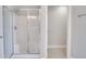 Bathroom with a shower stall and an additional room at 7041 Buttonbush Loop, Harmony, FL 34773