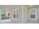 Side view of the front porch and home exterior at 7041 Buttonbush Loop, Harmony, FL 34773