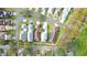 Aerial view showcasing a cluster of homes with similar architectural design at 7041 Buttonbush Loop, Harmony, FL 34773