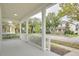 Front porch view of a charming residential street at 7041 Buttonbush Loop, Harmony, FL 34773