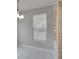 Simple dining room with neutral walls and tile flooring at 7041 Buttonbush Loop, Harmony, FL 34773