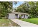 Charming ranch home with a large yard and one-car garage at 17 Lake Dr, Debary, FL 32713