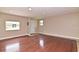 Bright living room with hardwood floors and an open floor plan at 110 Angeles Rd, Debary, FL 32713