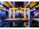 Basement game room features a pool table and Batman decor at 3955 Lana Ave, Davenport, FL 33897
