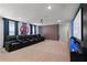 Home theater with reclining seats and Avengers-themed decor at 3955 Lana Ave, Davenport, FL 33897