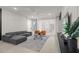 Spacious living room featuring a sectional sofa, armchairs, and a coffee table at 3955 Lana Ave, Davenport, FL 33897