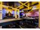 Batman-themed game room with pool table, air hockey, and arcade games at 3955 Lana Ave, Davenport, FL 33897