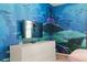 Bedroom with dresser and mounted TV featuring The Little Mermaid at 3955 Lana Ave, Davenport, FL 33897