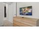 Bedroom with dresser and mounted TV featuring Toy Story at 3955 Lana Ave, Davenport, FL 33897