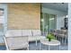 Relaxing patio area with wicker furniture and a small table at 3955 Lana Ave, Davenport, FL 33897