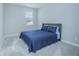 Well-lit bedroom featuring a double bed and plush carpeting at 5045 Rain Shadow Dr, St Cloud, FL 34772