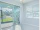 Bright breakfast nook with sliding glass doors leading to a patio at 5045 Rain Shadow Dr, St Cloud, FL 34772
