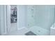 Bathroom with walk-in shower, and access to a closet at 5045 Rain Shadow Dr, St Cloud, FL 34772