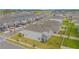 Two-story house with gray exterior, a fenced backyard, and a side view at 5045 Rain Shadow Dr, St Cloud, FL 34772