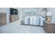 Main bedroom with king bed, large dresser, and plenty of space at 5045 Rain Shadow Dr, St Cloud, FL 34772