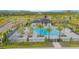 Community pool and cabana with surrounding landscaping and homes at 5045 Rain Shadow Dr, St Cloud, FL 34772