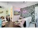 Studio apartment with open living space, featuring a sofa and bedroom area at 706 E Pine St # 5, Orlando, FL 32801