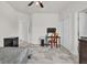 Bedroom with a bed, desk, and double doors to closet at 1178 Michelangelo Ln, Winter Haven, FL 33884