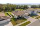Aerial view of single-Gathering home with a two-car garage and solar panels at 1178 Michelangelo Ln, Winter Haven, FL 33884