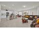 Modern kitchen with island, stainless steel appliances, and tile floors at 1178 Michelangelo Ln, Winter Haven, FL 33884