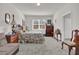 Spacious bedroom with a large window and carpeted floor at 1178 Michelangelo Ln, Winter Haven, FL 33884