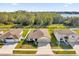 Aerial view of a house and neighborhood at 1178 Michelangelo Ln, Winter Haven, FL 33884