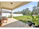 Covered patio overlooking a spacious backyard at 1178 Michelangelo Ln, Winter Haven, FL 33884