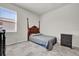 Bedroom with a bed, dresser, and window at 1178 Michelangelo Ln, Winter Haven, FL 33884