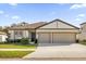 Two-car garage and well maintained landscaping at 1178 Michelangelo Ln, Winter Haven, FL 33884