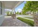 Inviting front porch with stone pillars and brick pavers at 14269 Shocklach Dr, Winter Garden, FL 34787